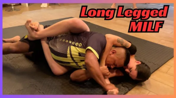 Milf with Long Legs Embarrasses Large Man - Competitive Underground Mixed Wrestling Club.webp