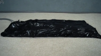Black vacuum bed without frame with pear gag and balls.webp