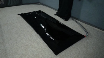 Magic ritual or waxing on a black vacuum bed.webp