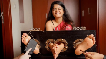 Avani's Ticklish Audition In The Stocks.webp