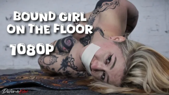 Bound girl on the cold floor [1080p].webp