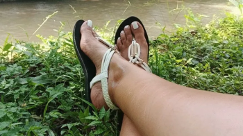 Beautiful feet are massaged while being worshipped by a man (3).webp