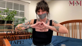 Carried Away With Tape! Tape Gags and Self Bondage.webp
