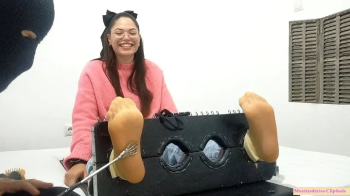 Stacy goes crazy in the stocks (side camera).webp