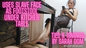 Tied & Ignored- Vaping Goddess Uses Slave Face as Footstool Under Kitchen Table.webp