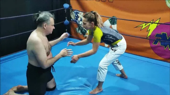 MMA girl vs bigger guy.webp
