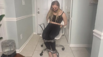 Agent Phoenix Sinz is bound and gagged.webp