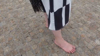 Walking barefoot in an island.webp
