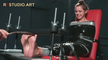 Leya in Black Film Mummification - Bare Feet Tickling in Toe-Pressing Device (HD 720p MP4).webp