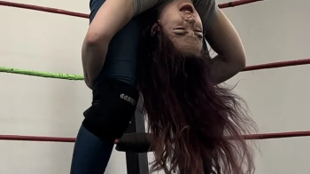 Blonde KO and drops brunette on her head.webp