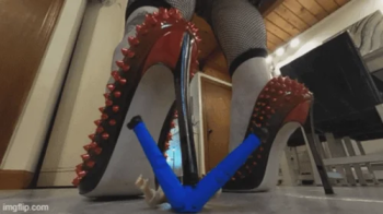 In & Under Madam Giantess' big boots and lethal heels VR.webp