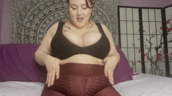Giantess puts tiny man in her leggings.webp