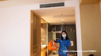 Asian female delivery girl is tickled.webp