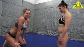 Kimbra vs Rada Gold competitive female wrestling match.webp