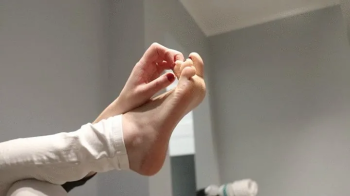 Feet Playing during watching Tv.webp