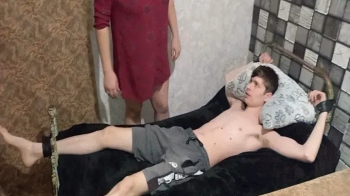 Chained to the bed for tickling MP4.webp