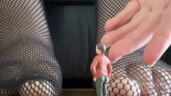Carina Racy - Giantess Fishnet Foot Play.webp