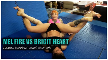 Flexible dominant ladies wrestling - Mel Fire vs Brigit Heart.webp