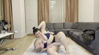 Ina Demonstrates Holds on Her Slave.webp