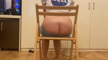 Buttcrack farting on chair'.webp
