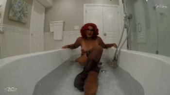Giantess Sahrye takes you into the tub.webp