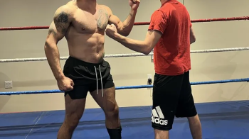 Barefoot Men's Strip Match - Big Muscled Stud v Skinny Guy.webp