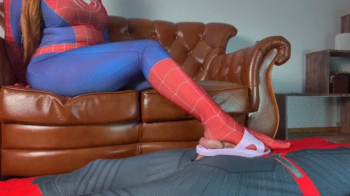 Spider Woman And Purple Super Heroine Weronika Keeps Balls Of Spiderman In Her Flip-flop And She Flattens Them With Her.webp