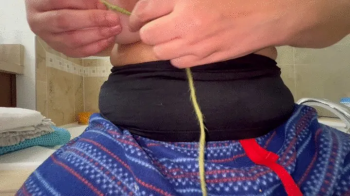Nipples tied with string.webp
