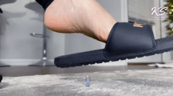 Giantess Slides Dangling Over Tiny Man.webp