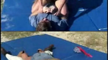 Topless Blonde Muscle Wrestling.webp