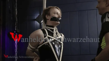 RIKKI IN LATEX TAPE GAGGED and SUSPENDED HD 720p.webp