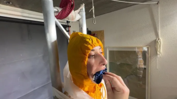 Myxxxy bound and Pantygagged in shiny nylon Rainwear.webp