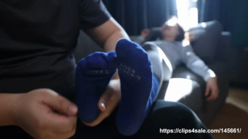 Woman with smelly socks and smelly feet is tickled.webp
