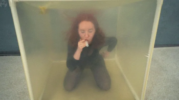 Experiments with poses in a transparent vacuum cube.webp