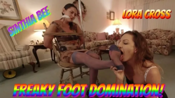 Sinthia Bee & Lora Cross In A Freaky Foot Domination!.webp