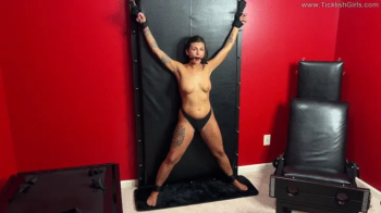 Scarlett Gagged and Vibed on the Bondage Wall - (Gag Only).webp