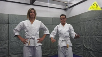 Samantha vs Kim judo gi match.webp