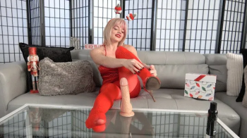 MERRY CHRISTMAS WITH SAGE PILLAR IN RED PANTYHOSE (4K).webp