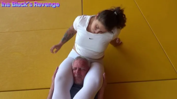 Gabi in White Dominates on the Mat.webp