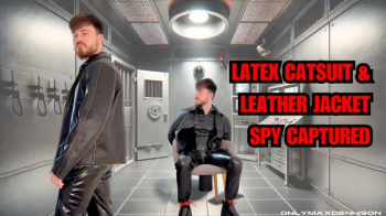 Latex catsuit & leather jacket spy captured.webp