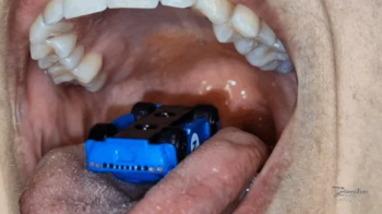 Micro machines inside a giantess mouth.webp