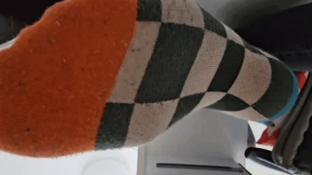 Unaware Giantess Working on Laptop in Socks Pt 6.webp