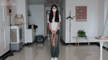 xy297 - cute girl in jeans tied with ropes on bed.webp