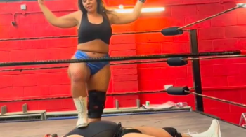 Ball busting mixed wrestling match.webp