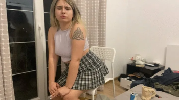 Farting in skirt on chair while smokingg.webp