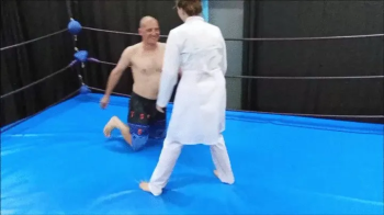 Mixed wrestling in a real medical outfit.webp