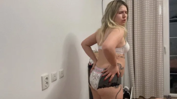 Bloated belly latina farting in diaperss with face expressions.webp