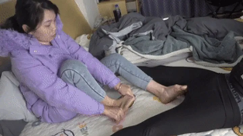 Mature woman's stockings rub against her feet, cock ejaculates!.webp
