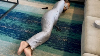 Paid to Escape 9 -Blake LaVista is challenged to escape from bondage mummification.webp