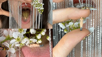 Floral tenderness for a tiny lady in the giantess's mouth.webp